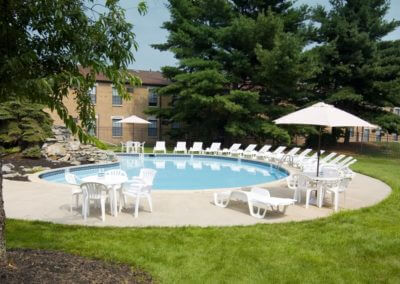 Swimming pool with sun deck and free poolside Wi-Fi for residents at Willow Shores.